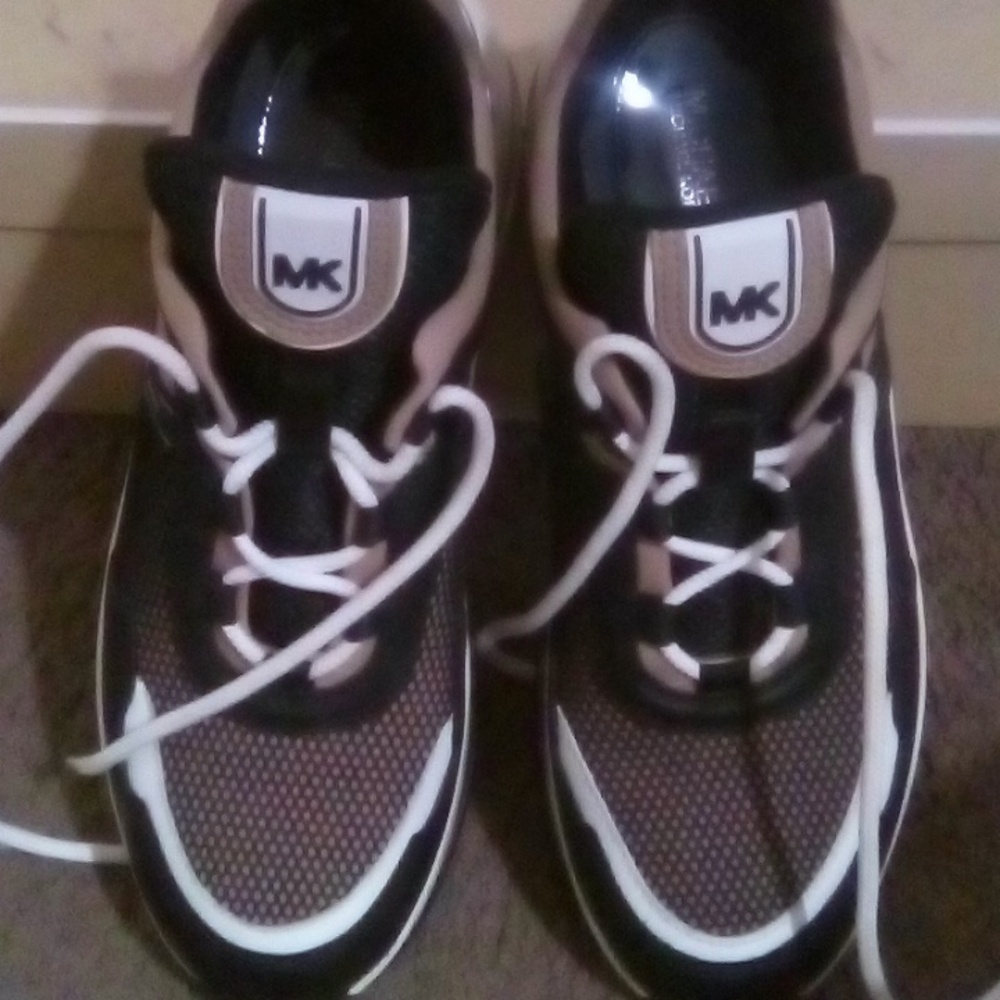 Michael Kors Olympia Extreme Sneakers For Women Or Men